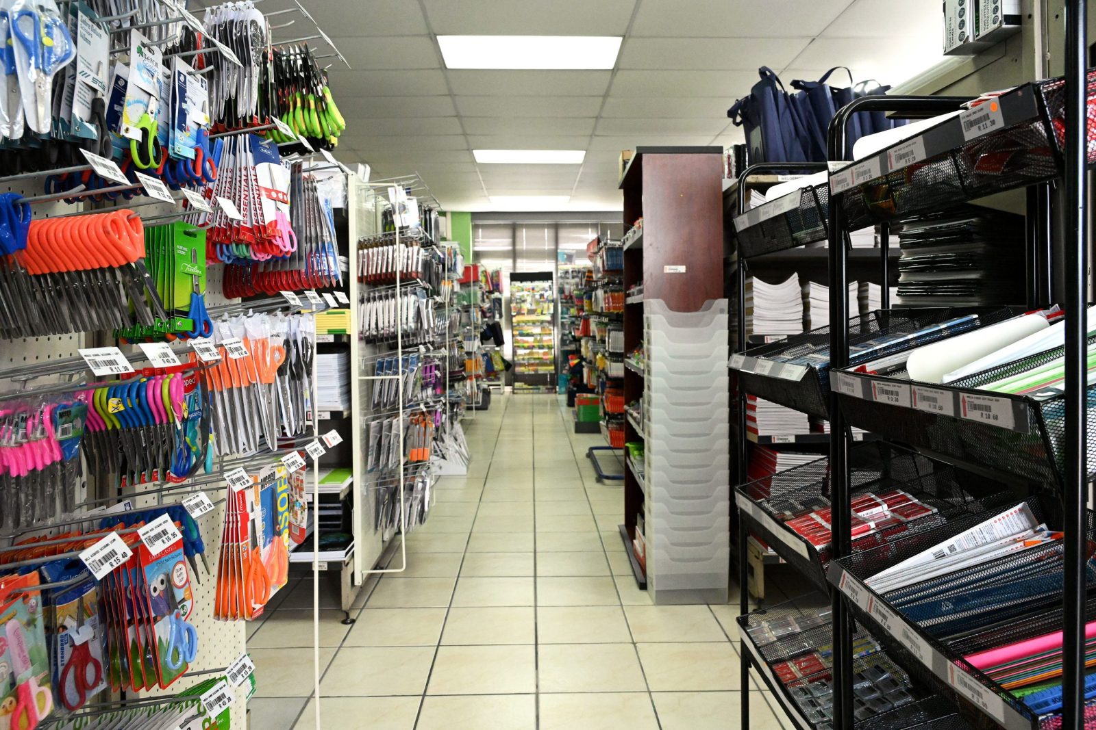 Retail shelves filled with essential school supplies and classroom materials