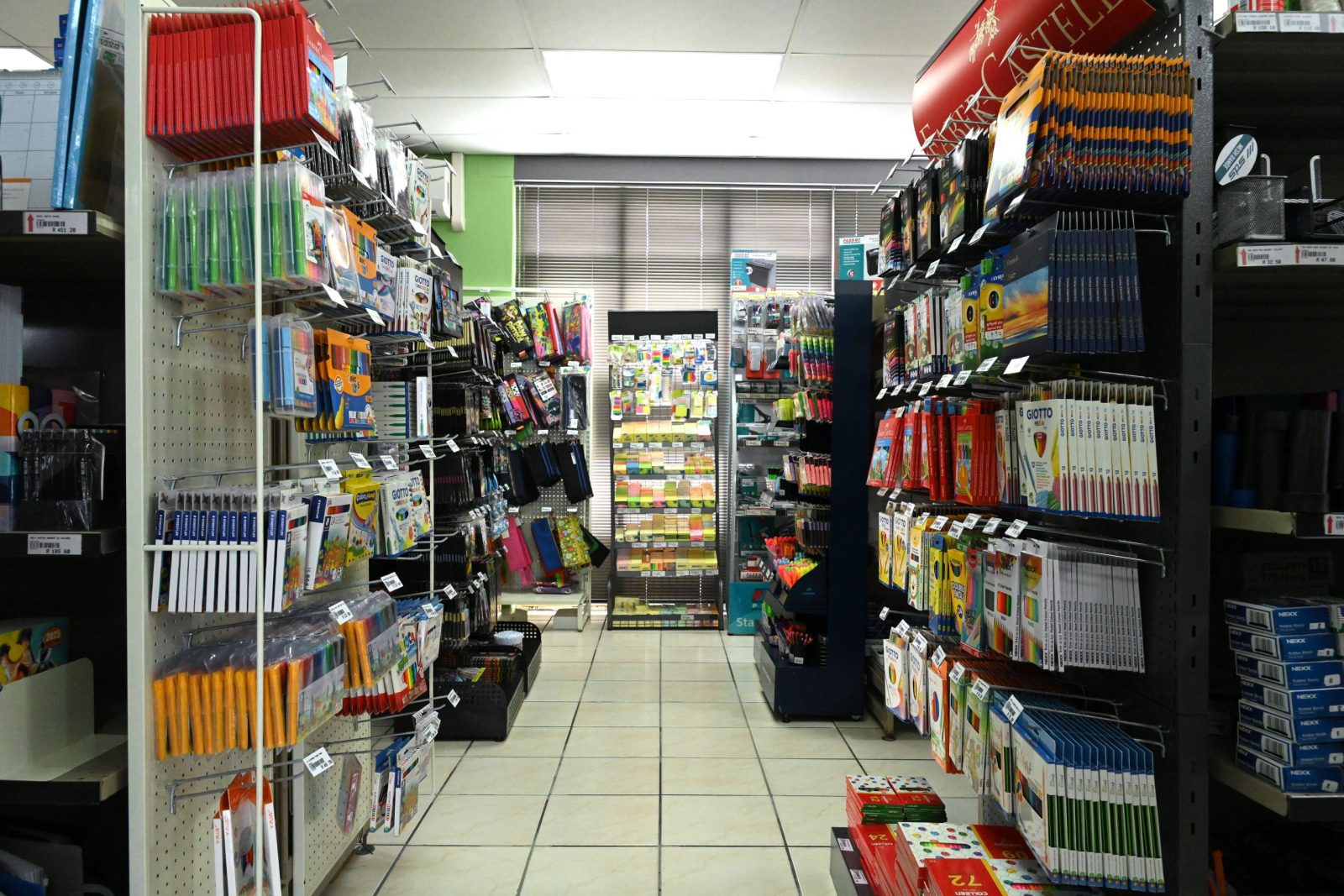 Rows of neatly arranged stationery items and learning resources