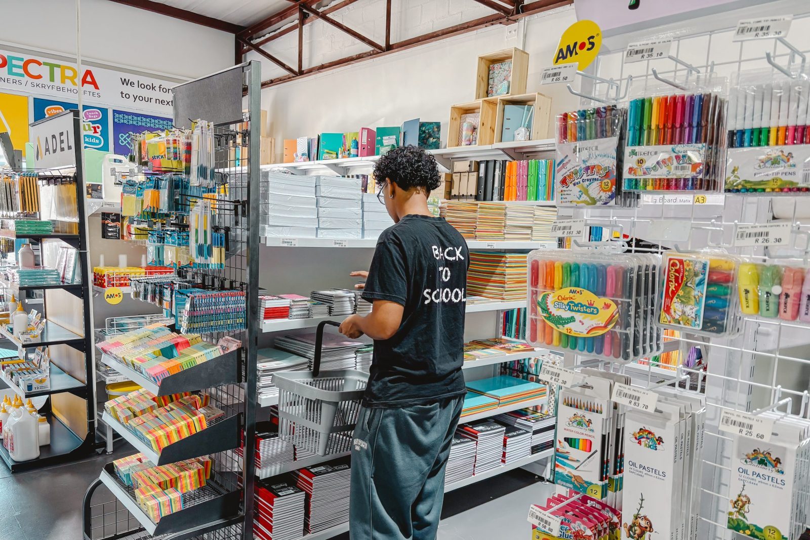 Selection of educational books, stationery and office essentials on display