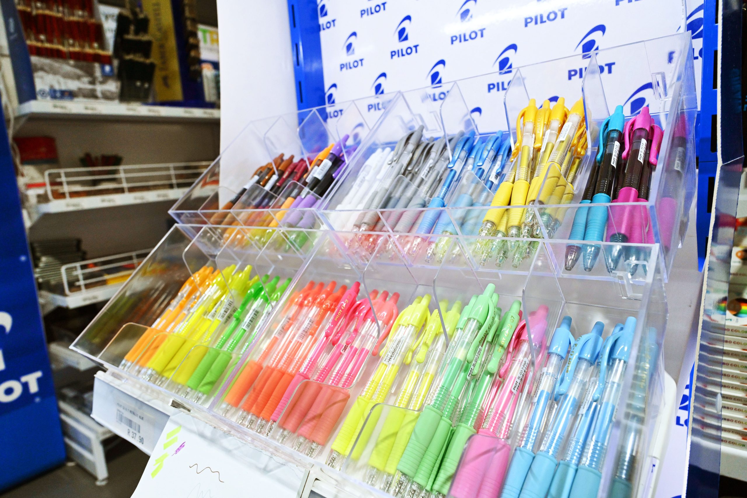 Store shelving showcasing a variety of educational and office products